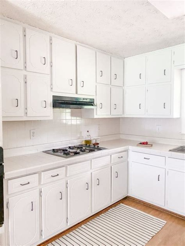 How do you strip kitchen cabinets without sanding?
