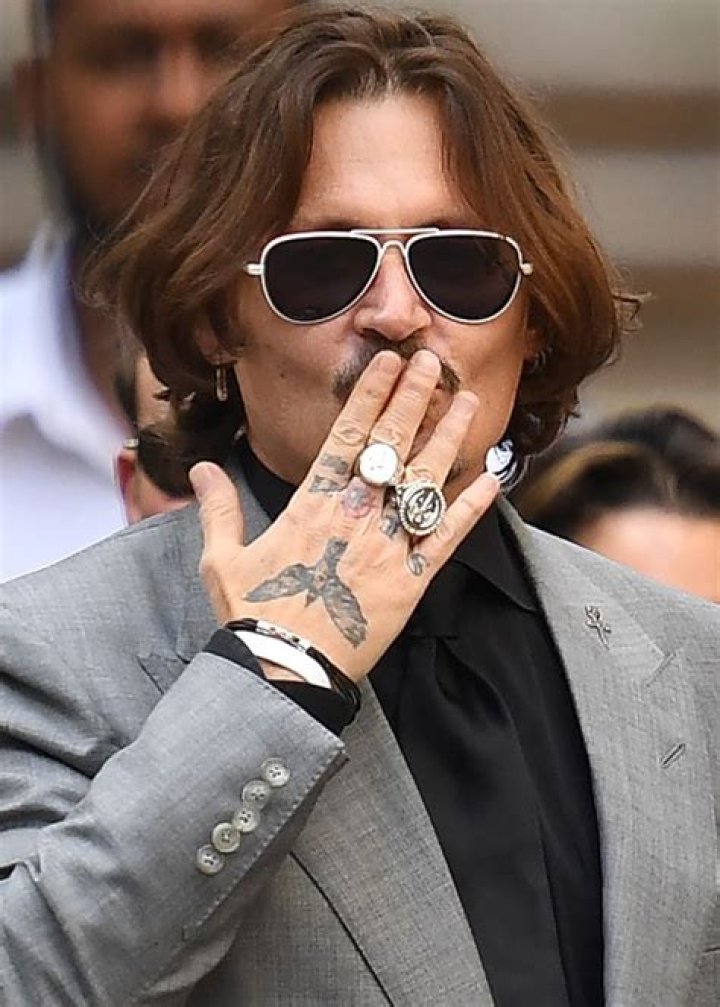 How many tattoos does Johnny Depp have?