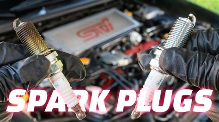 Should you let your engine cool before changing spark plugs?