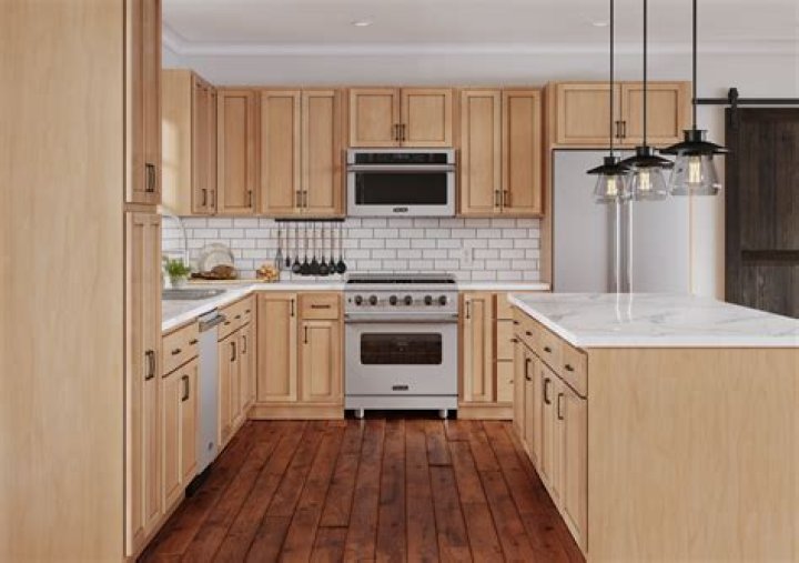 Which is more expensive oak or maple cabinets?