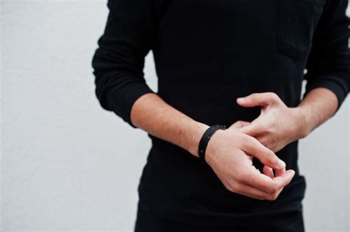 Why do we wear black thread on wrist?
