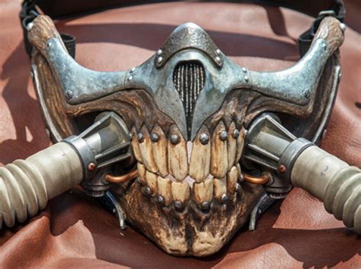 Why does Immortan Joe wear a mask?